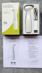 Nira White Handheld Laser Anti-aging Device With Box Instructions Used New. Price: $166.50.