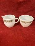 Vintage Corning Pyrex Crazy Daisy Sugar Bowl & Cream Cup Set Used. Price: $14.99.
