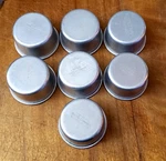 7 Vintage West Bend Aluminum Miniture Cake Pan Soap Wax Candy Muffin 1/2 Molds Used. Price: $30.00.